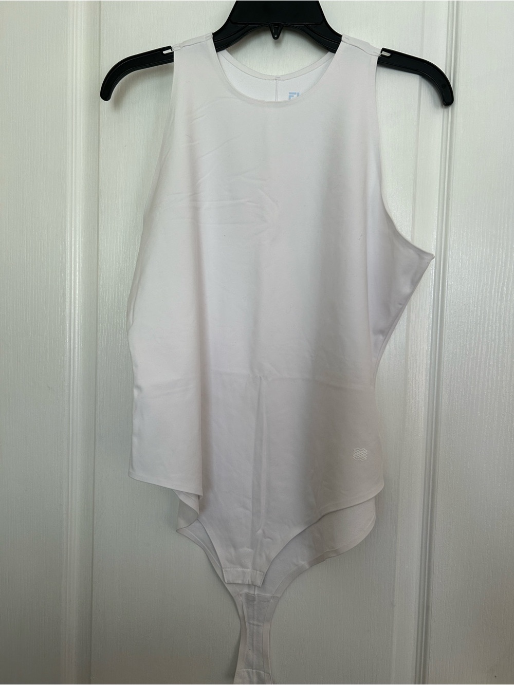 FLX Urban Commuter White Sleeveless Bodysuit. Size XL, 22 PTP,‎ but has stretch